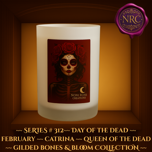 Series #311 February Day of the Dead Catrina Candle featuring skeletal face with heart and rose sugar skull details, crimson dress, and golden stars by Noni Ross Creations